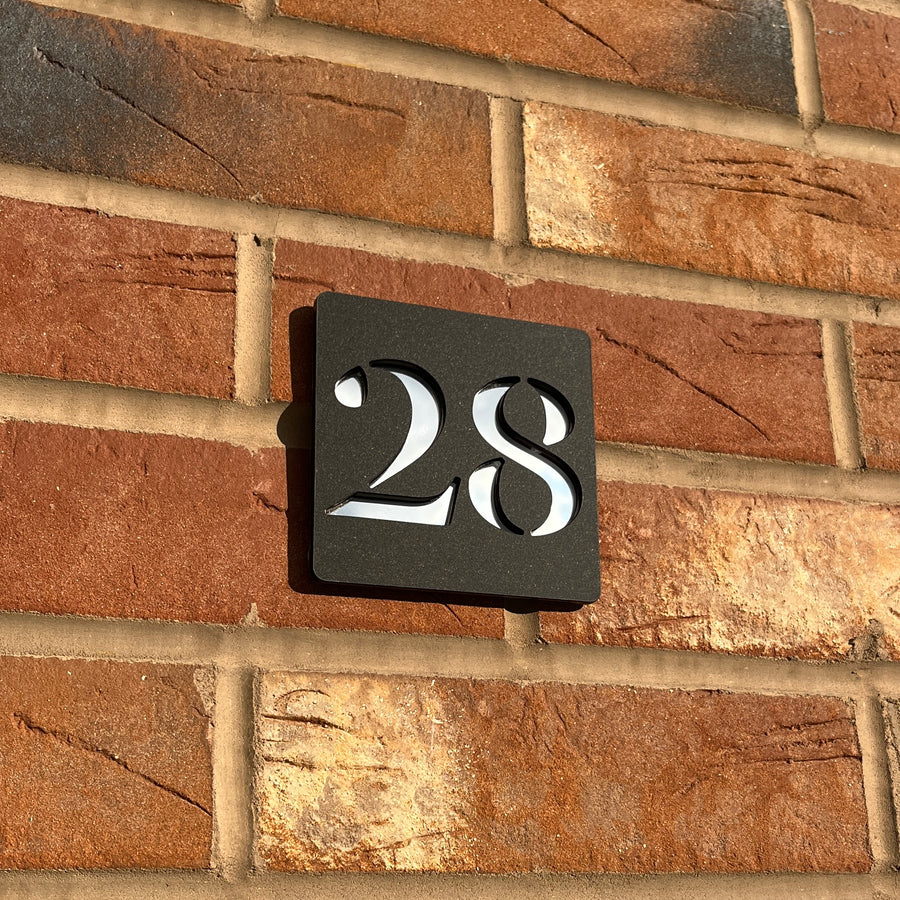 Stick on door number sign in matt black with silver mirror backing – no-drill acrylic