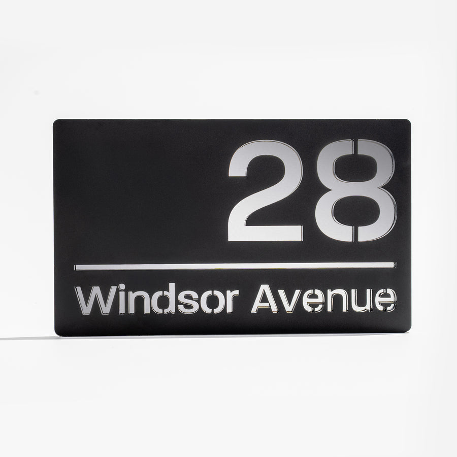Modern matt black house sign with silver mirror backing – personalised acrylic design