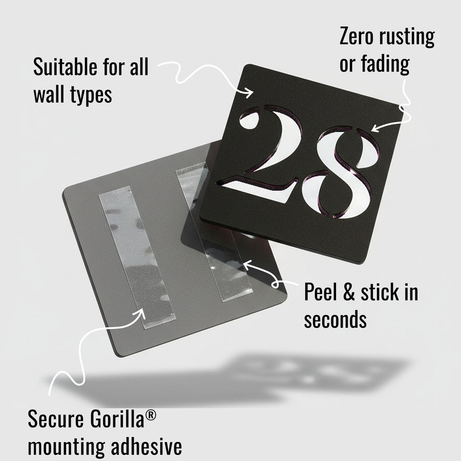 Matt black stick on door number sign installed on wall – modern acrylic design