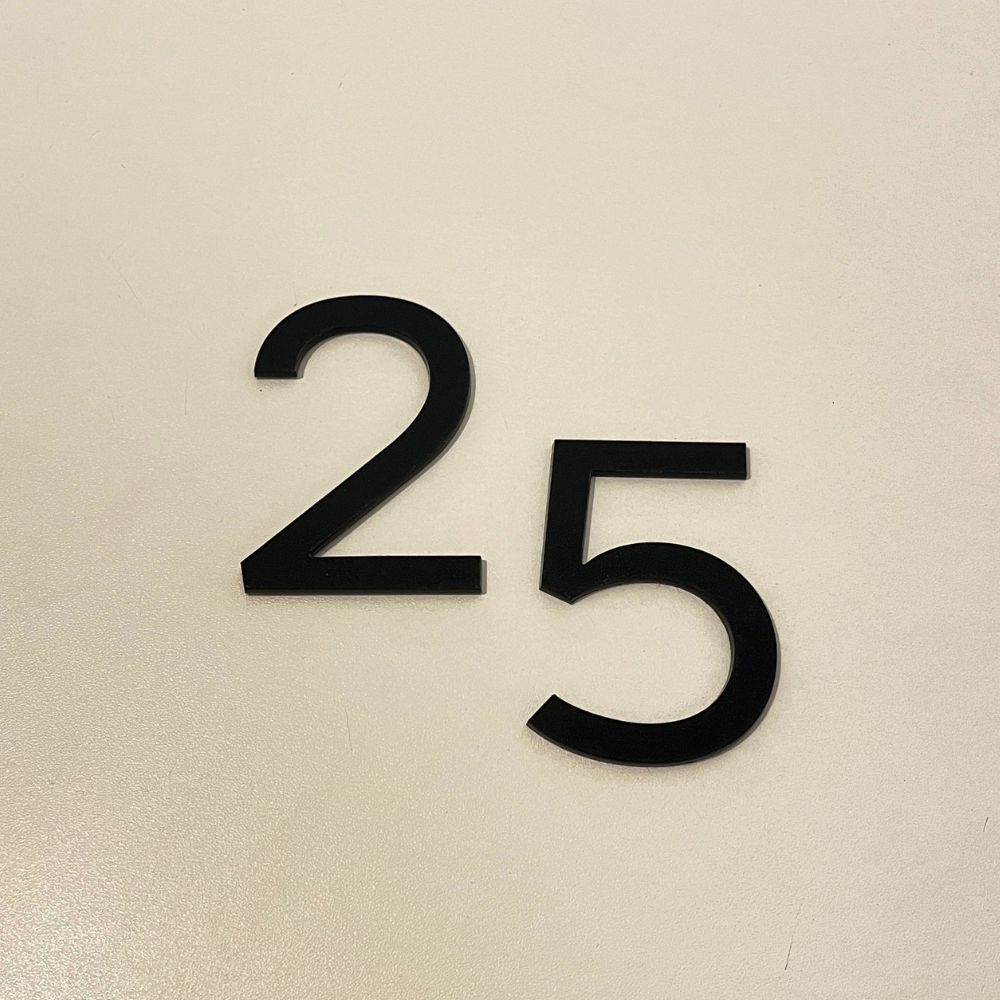 Stick on house numbers in matt black – individual acrylic digits for modern homes