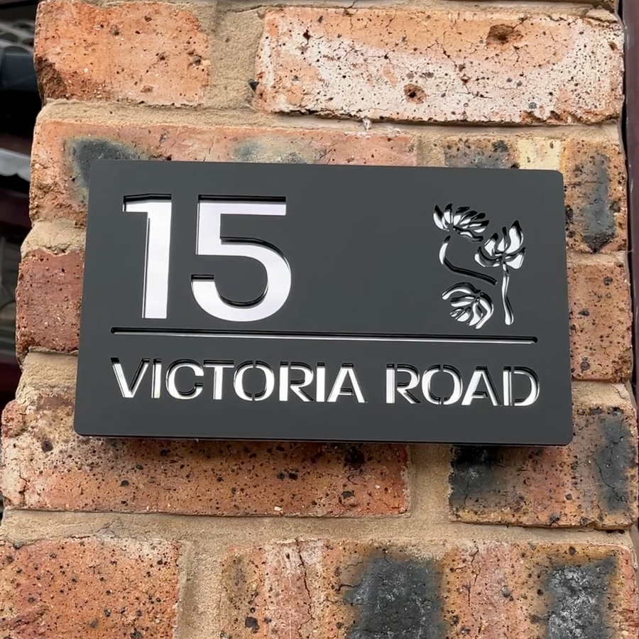 Modern floral house sign in matt black with silver mirror backing – acrylic design