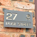 Rose floral house sign in matt grey with gold mirror backing – flat lay