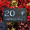 Liverpool Liver Bird house sign in matt black – installed on wall with silver mirror finish
