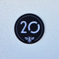 Manchester Bee House Sign in matt black with house number 20 and bee emblem, front view