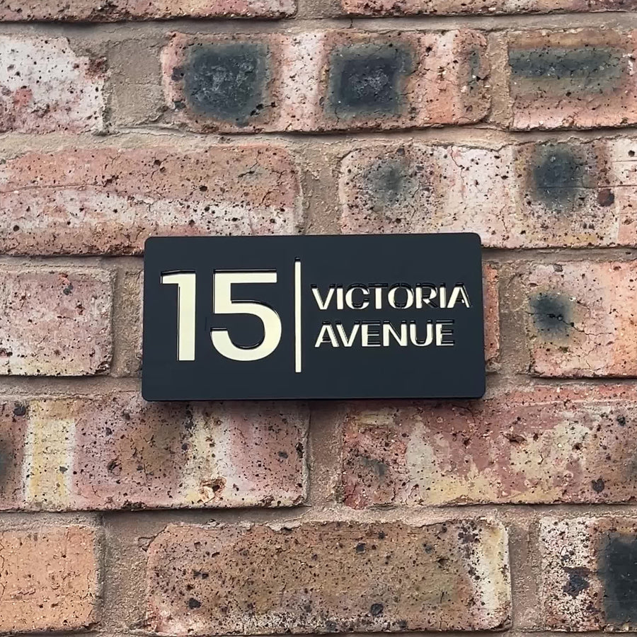 Stick on house sign in matt black with gold mirror backing – no-drill acrylic sign installed