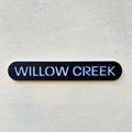 Modern house name sign installed on rendered wall – stick on acrylic