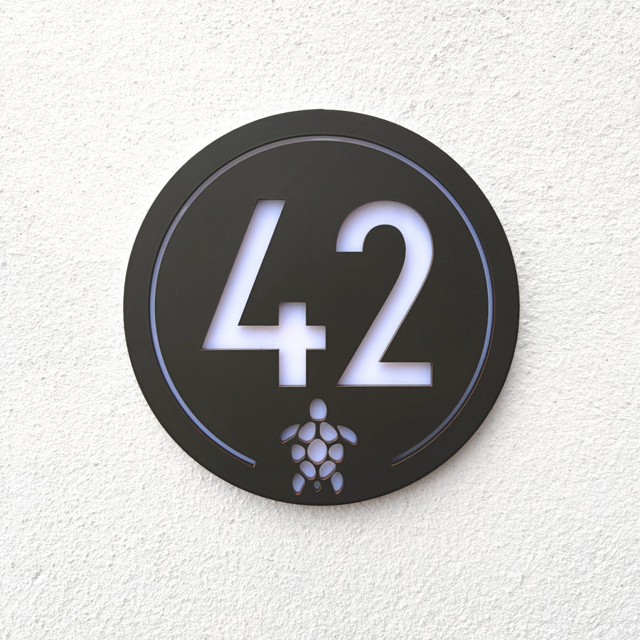 Turtle House Sign in walnut brown with house number 42 and turtle motif, front view
