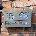 Welsh Dragon house sign installed on wall – personalised matt grey acrylic