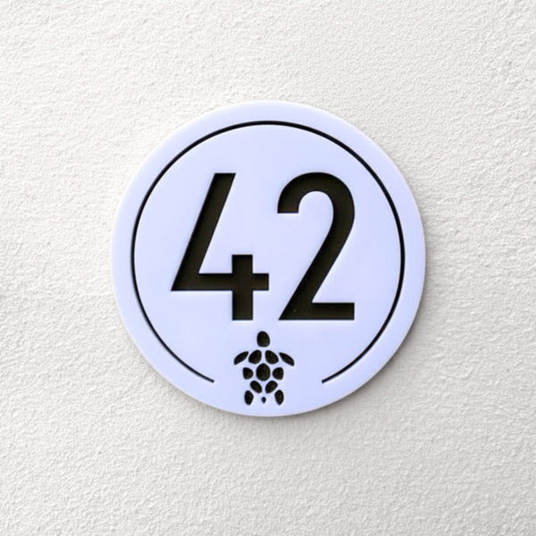 Turtle House Sign in white with house number 42 and turtle motif, front view