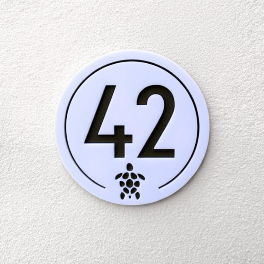 Turtle House Sign in white with house number 42 and turtle motif, front view